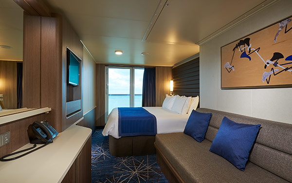 Photo showing balcony cabin interior for Hawaii golf cruise.